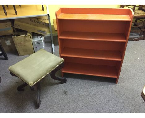 A four shelf bookcase and piano stool with serpentine legs.