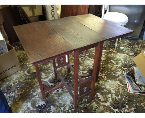 A small gate leg occasional table.