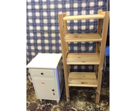 A bedside table with drawer and cupboard and four shelf pine shelving unit.