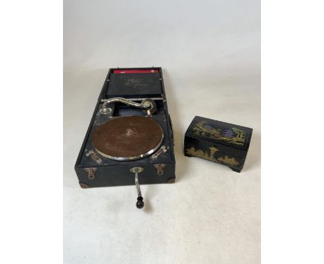 A Golf- Lecenced Odeon record player with a crank together with a Chinese lacquer music box 