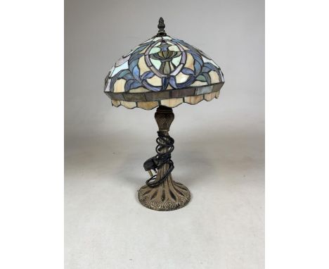 A stained glass shade with later lamp base. H:46cm