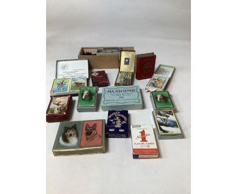 A collection of card games, playing cards and a box wood chess set. To include Shuffled Symphonies Disney card game, Muggins 