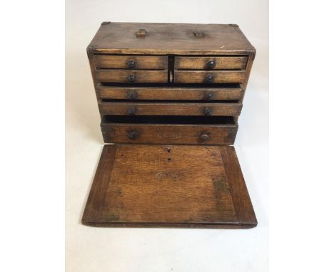 A Moore and Wright 20th century tool makers cabinet. Stamped M&amp;W. W:43cm x D:23cm x H:29cm