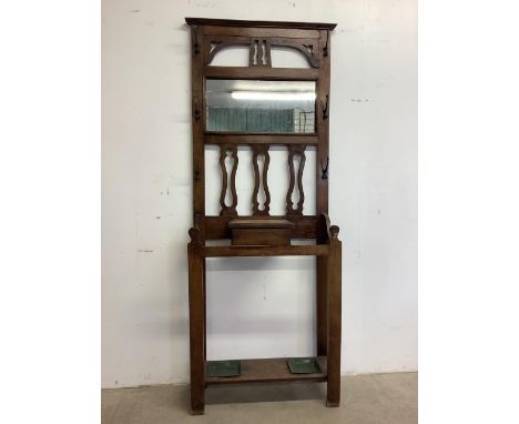 An early 20th century art nouveau style oak hall stand with metal hooks drip trays with glove and key boxW:73cm x D:27cm x H: