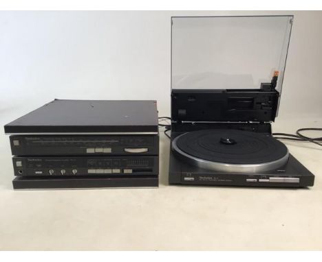 A Technics SL-3 DC Servo Automatic Turntable System record player, radio (AM/FM) and amplifier. (Not tested)