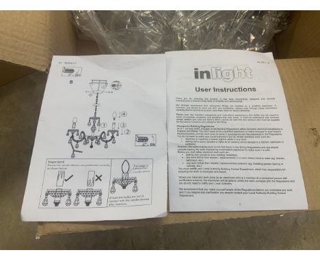 A boxed electric ceiling chandelier by InLight. In original packaging and with light bulbs. 