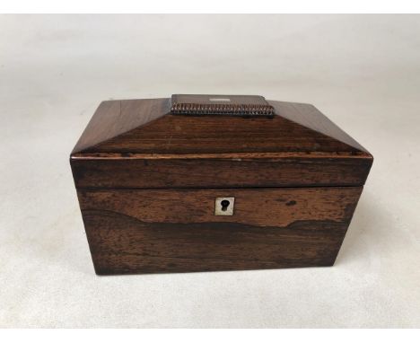 A Victorian rosewood sarcophagus tea caddy with mother of Pearl decoration to top and escutcheon. Two lids to inside W:20.5cm