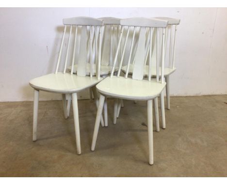 A set of four Ercol style mid century chairs painted white. Seat height H:43cm