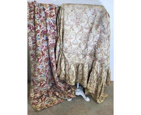 A pair of vintage printed curtains trimmed with corded gimp W:88cm x H:255cm approx some wear to edge and hem together with a