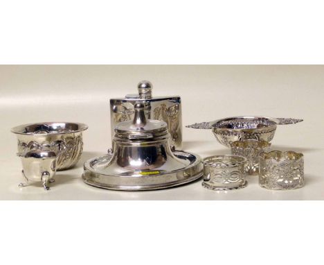 Silver hip flask, two small bowls, mustard potand spoon, inkwell and three napkin rings Condition report: see terms and condi