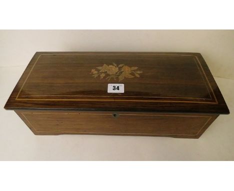 An early 20th century Swiss musical box playing six airs 