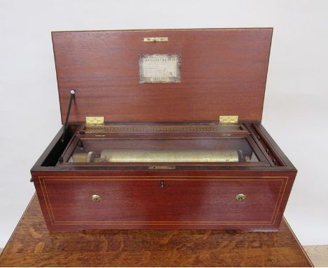 A Nicole Freres 13" cylinder music box, striking on 10 bells playing 6 Airs in latere mahogany case