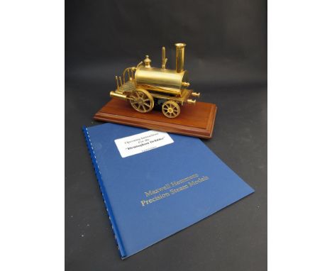 A Maxwell Hemmens limited edition gold plated steam model of the "Birmingham Dribbler" 19cm long, with wooden plinth and oper