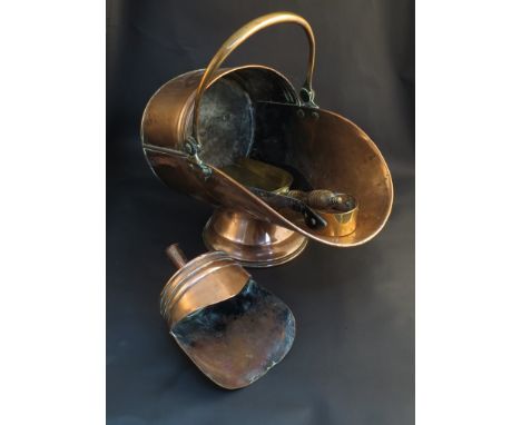 A copper helmet coal scuttle and accessories