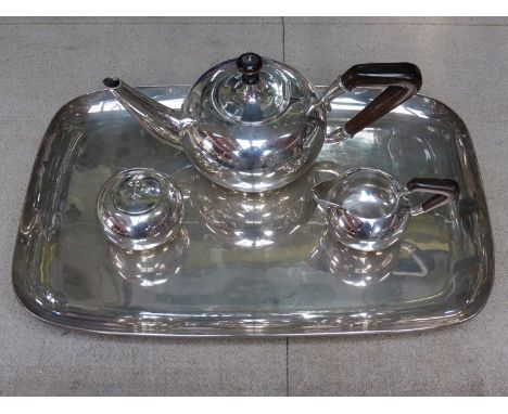 A Sanborn Mexico sterling silver three-piece tea set on engraved presentation tray, treen handles, slight denting to foot, tr