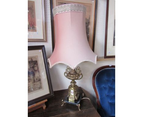 An ornate brass lamp in the classical 19th Century style on raised marble base with shade, 97cm tall
