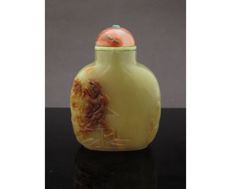 An 18th-19th Century Chinese jade snuff bottle of plain form, the skin of the stone carved to show two fishermen in a landsca