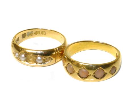 Two Victorian 18ct gold five-stone rings, to include a coral five stone ring together with a split pearl five stone ring (pea