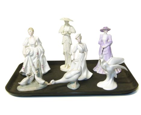 Four Coalport figures, two NAO figures and a Royal Doulton group Condition reports are not available for Interiors sales.