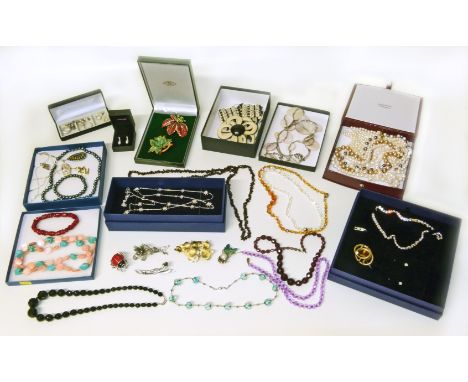 A selection of costume jewellery, to include a Christian Dior foliate brooch and a Swarovski star necklace, boxed (q). Condit