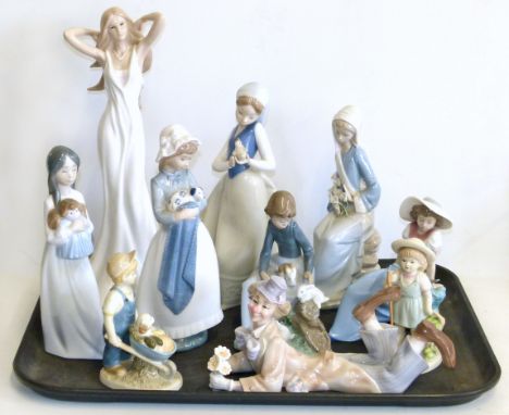 Seven Nao, Leonardo figures, one Lladro figure and two Regal figures. Condition reports are not available for Interiors sales