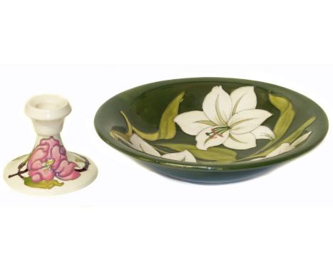 Magnolia on green Moorcroft dish and candlestick. Condition reports are not available for Interiors sales.