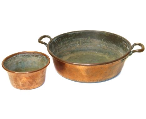 Georgian copper two handled pan 45cm diameter and 13cm high and small 23cm diameter copper planter. Condition reports are not