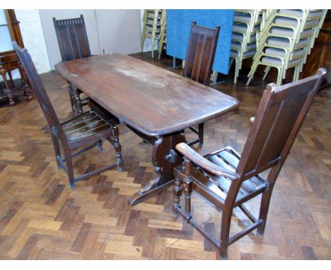 Ercol dining table and four chairs Condition reports are not available for Interiors sales.