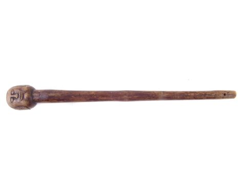 South African Knobkerrie, carved with face and lead weighted, 47cm long. Condition reports are not available for Interiors sa