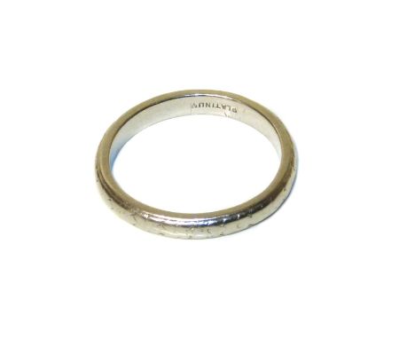 A band ring, with engraved detailing, stamped platinum, ring size I, gross weight 3.1g. Condition reports are not available f