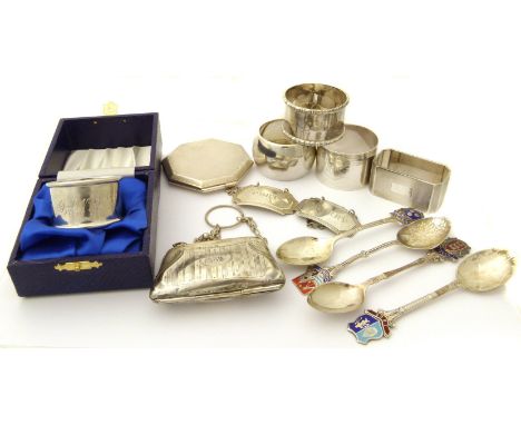 A selection of silver items, to include spirit labels, napkin rings, a compact, a silver purse, souvenir spoons etc, gross we