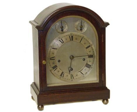 Early 20th century domed top bracket clock on ball feet. Condition reports are not available for Interiors sales.