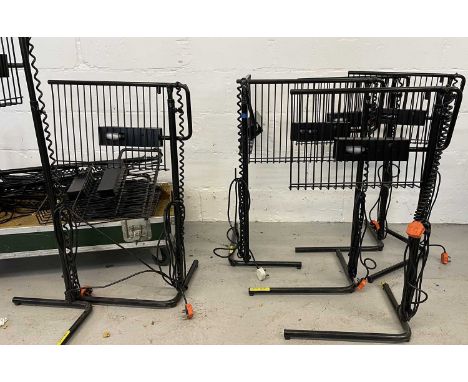 12 adjustable stands, each with light and plug, in a flight case on casters.Originally used at 'Strawberry Rentals' and likel