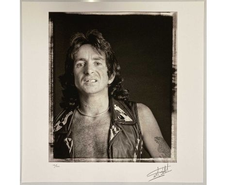 A limited-edition photo print depicting Bon Scott of AC/DC, taken by Martyn Goddard during the band's first photoshoot at She