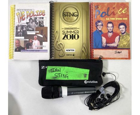 A softcase (written to side 'Ian Sting') containing a Sennheiser e865 microphone, two pairs of in-ear headphones. All will ha