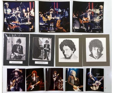 Three blown up / large format (13.5 x 13.5") photographs depicting Eric Clapton onstage during the 'Unplugged' concert, five 