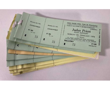 A collection of partial ticket books, with approximately 181 complete, untorn and unused tickets for Judas Priest at the Manc