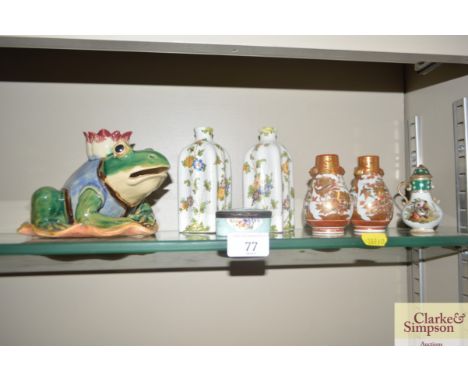 An oriental pottery candle holder in the form of a toad, with character mark to base; a pair of Faience style vases; a patch 