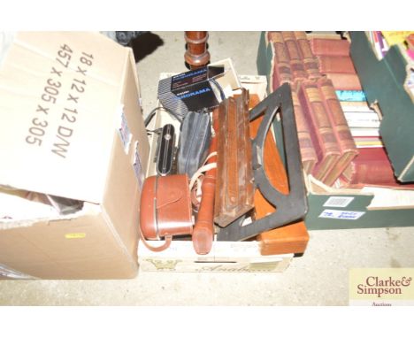 A box containing a slide rule; music stand; recorder; cameras etc