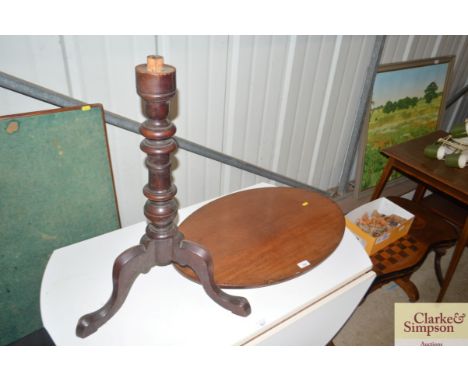 A 19th Century mahogany oval topped occasional table raised on tripod base  AF