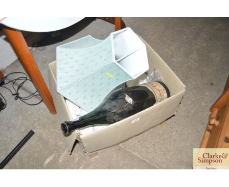 A box containing empty bottle of Merrydowns vintage cider, a table lamp and various china