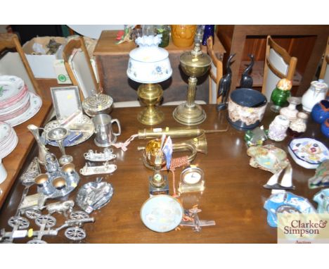 A brass oil lamp, brass table lamp, a bugle, sporting trophy etc.