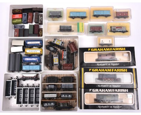 A quantity of Graham Farish, Trix etc N gauge railway. 2 locos- National Coal Board Class J94 0-6-0 Saddle Tank, RN 61 in dar