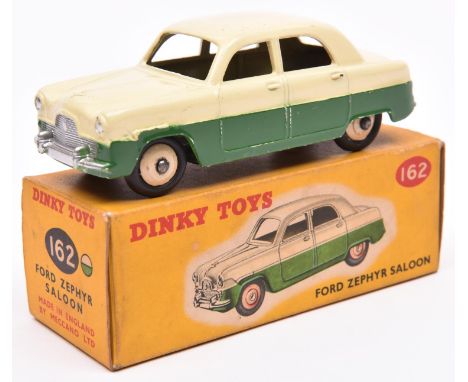 Dinky Toys Ford Zephyr Saloon (162). An example in cream and dark green with darker cream wheels and black tyres. Boxed, ligh