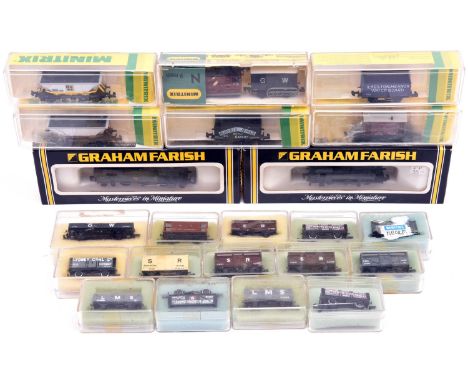 A quantity of Graham Farish, Minitrix Peco N gauge railway. BR 2-6-2 tank locomotive, RN 6115 in lined Brunswick Green, plus 