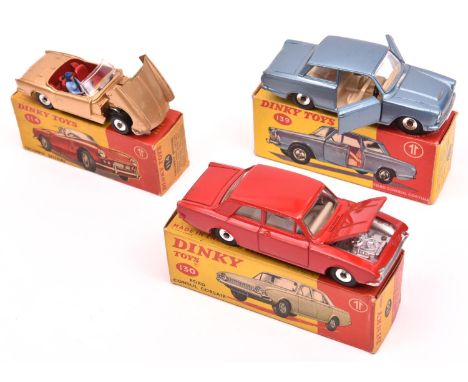 3 Dinky Toys. Triumph Spitfire (114). An example in metallic gold with red interior, example without label to bootlid. Plus a
