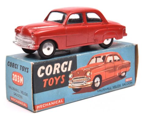 Corgi Toys Mechanical Vauxhall Velox Saloon (203M). An example in red with smooth spun wheels and black tyres. Boxed, with le