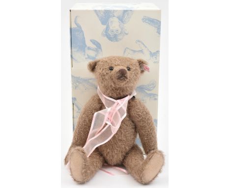 3 Steiff. A 2010 Limited Edition 'Keepsake' Teddy Bear'. (661884). 32cm, covered in Caramel Mohair fur, with a pink tied ribb