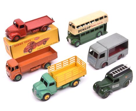6 Dinky Toys. Fordson Thames flat Truck (422) in red with red wheels, boxed. Plus 5 loose examples- a Dodge Farm Produce Lorr
