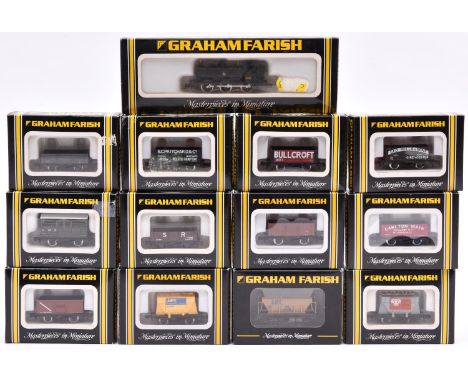 A quantity of Graham Farish N gauge railway. A BR 0-6-0 Pannier Tank RN 7777 in unlined black livery. Plus 12 freight wagons 